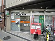 西成千本郵便局 122m