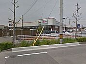 スーパー「マルアイ魚住店まで322m」