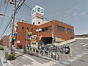 スーパー「コープ魚住まで264m」