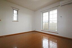 フローラ・フレーバー 2階1LDKのリビング/ダイニング