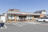 周辺：セブンイレブン 高槻安満中の町店（402m）