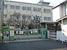 周辺：高槻市立冠小学校（725m）