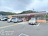 周辺：セブンイレブン神戸名谷町賀市店 徒歩12分。 940m