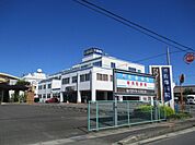 病院「佐藤病院まで888m」