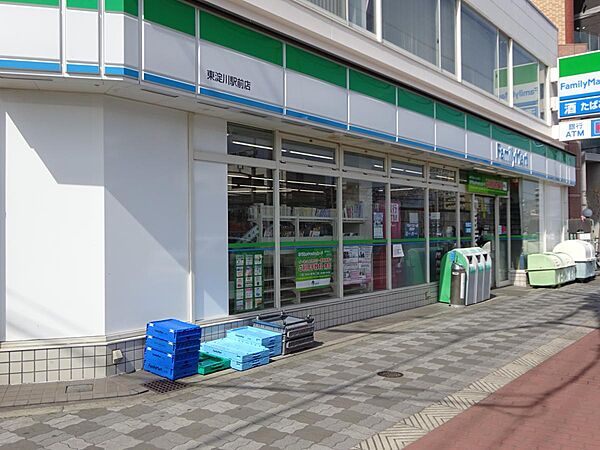 画像25:【コンビニエンスストア】ファミリーマート 東淀川駅前店まで338ｍ