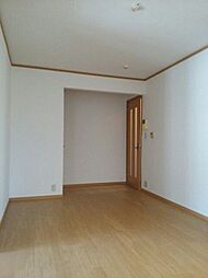 スイートとまと三番館 101 1階2LDKのリビング/ダイニング