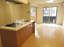 クロニクル 1階1LDKのリビング/ダイニング