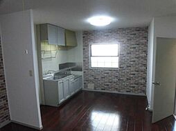 リバーサイド西城 1階1LDKのリビング/ダイニング