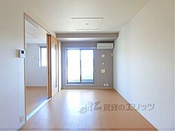 カーサ・デルソーレIII 104 1階1LDKのリビング/ダイニング