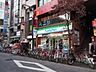 周辺：ファミリーマート千歳烏山駅東口店 303m