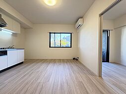 Deux・Courage 1階1LDKのリビング/ダイニング