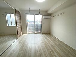 ドゥ・マリアージュIII 1階1LDKのリビング/ダイニング