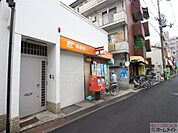 西成花園郵便局まで520ｍ