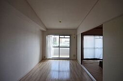 広島電鉄宮島線 修大協創中高前駅 徒歩7分の賃貸マンション 4階2DKのリビング/ダイニング