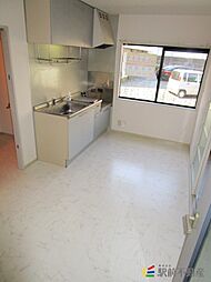 フロイント長門石 102 1階3DKのリビング/ダイニング