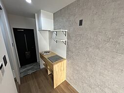 カハラ 104 号室 1階1Kのリビング/ダイニング