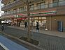 周辺：セブンイレブン大和桜ケ丘東口店 148m