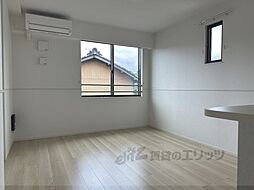 ウィズ・テール南彦根1号館 203 2階1LDKのリビング/ダイニング