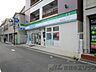 周辺：ファミリーマート　正雀駅東口店 徒歩8分。 620m