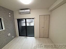 Emia千里丘 1階1Kのリビング/ダイニング