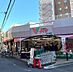 周辺：コモディイイダ東十条店 徒歩11分。 820m