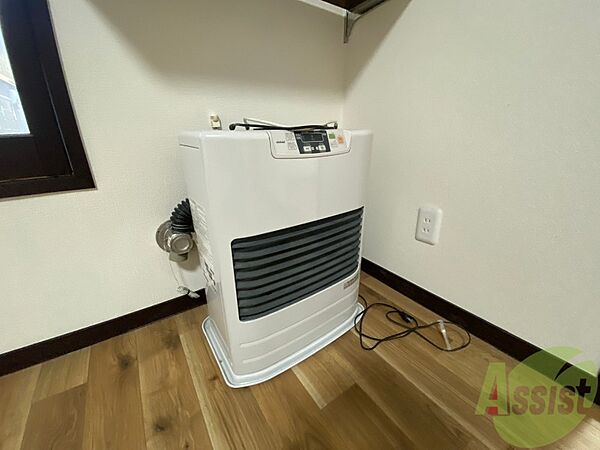 画像19:給湯器は簡単操作で温度調整ができますよ。
