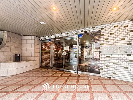 住む人や訪れる人やさしくエスコートする玄関アプローチ。