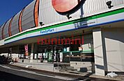 ファミリーマート阪急総持寺駅前店 122m
