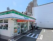 ファミリーマート千里丘北口店 246m