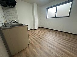 プルミエ朝潮 1階1LDKのリビング/ダイニング