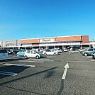 スーパー「デリシア庄内店まで945m」