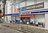 周辺：ローソン近鉄富雄駅前店 570m