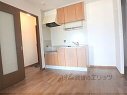 京都市営烏丸線 北大路駅 バス17分 西賀茂車庫前下車 徒歩11分の賃貸アパート 1階2Kのリビング/ダイニング