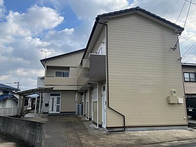 外観：該当場所は建物の手前になります。（103号室）