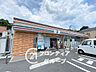 周辺：セブンイレブン生駒山崎町店 徒歩19分〜22分 1450m