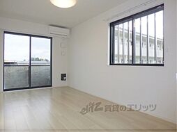 ラクーン守山 3階1LDKのリビング/ダイニング