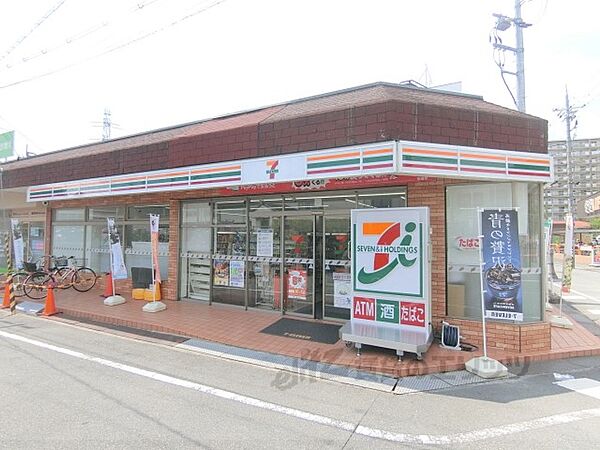画像21:セブンイレブン　枚方牧野駅西口店まで900メートル