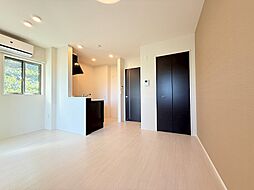 シャレード 2階1LDKのリビング/ダイニング