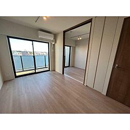 オープンブルーム二子 2階2LDKのリビング/ダイニング