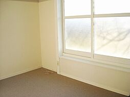 レオパレススリーナイン 205 2階1Kのリビング/ダイニング