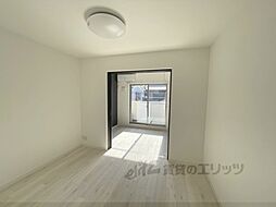 ジーメゾン生駒プレシール 1階1LDKのリビング/ダイニング