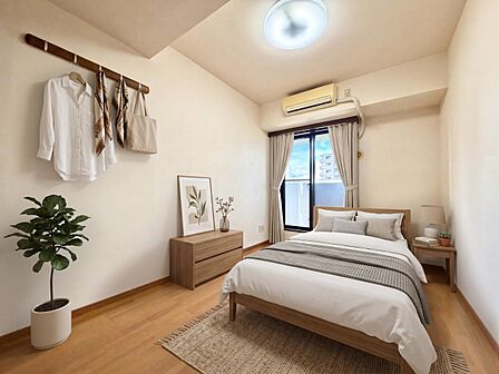 【寝室】柔らかな陽光とフローリングの色味が調和した快適な空間。※家具はCGです
