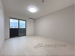 クアトロ・ソレイユ 107 1階1Kのリビング/ダイニング