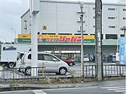 ジャパン　四条畷店まで2100メートル