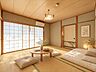 和室：足を伸ばしてくつろげる和室。日々の疲れを癒す、心安らぐ空間です。※実際の写真に家具や調度品をCG合成したものです。