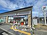 周辺：セブンイレブン伏見石田大山店 徒歩2分。 150m