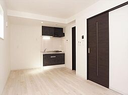 ジーメゾン八千代エクシア 3階1LDKのリビング/ダイニング