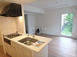 ミカエルアルファ 405 4階1LDKのリビング/ダイニング