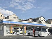 ローソン　生駒壱分インター店まで700メートル