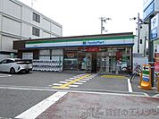 ファミリーマート江坂町二丁目店 徒歩6分。 460m